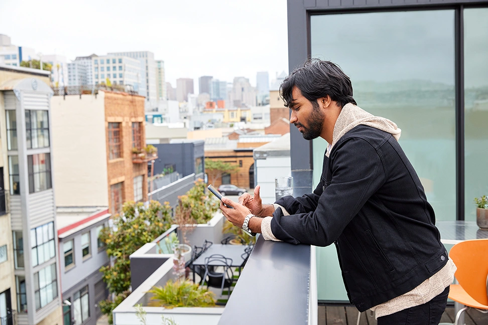 http://man-texting-on-rooftop